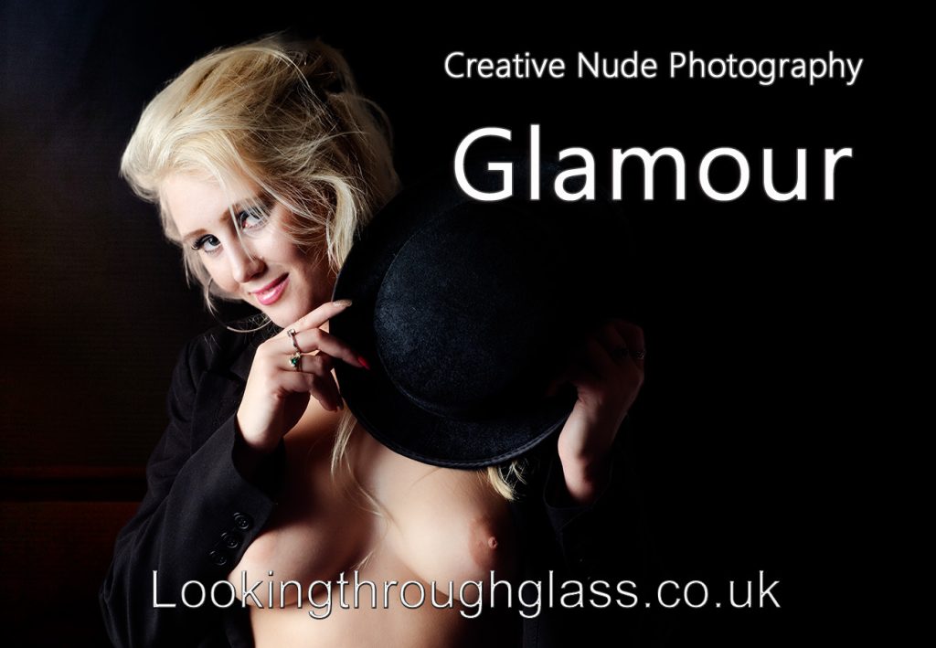 Creative nude glamour photography. Photo of blonde girl with a top hat