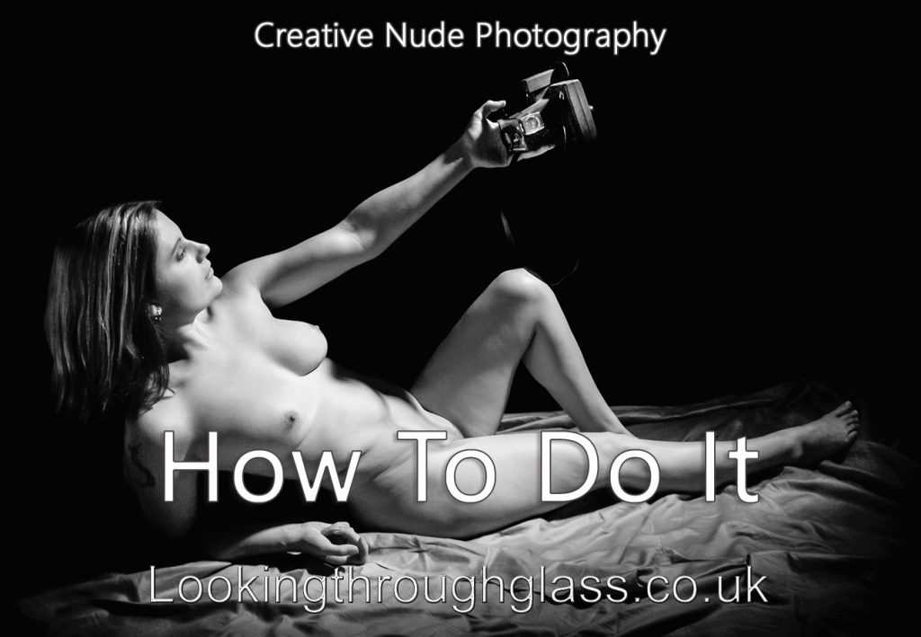 Creative nude photography Photo of a nude woman photographing herself with a Polaroid camera